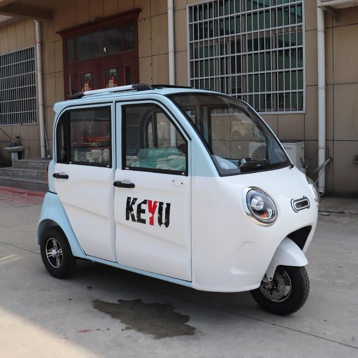 A new three-wheeled closed car built at the plant in 2024