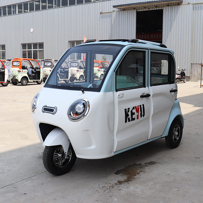 A new three-wheeled closed car built at the plant in 2024